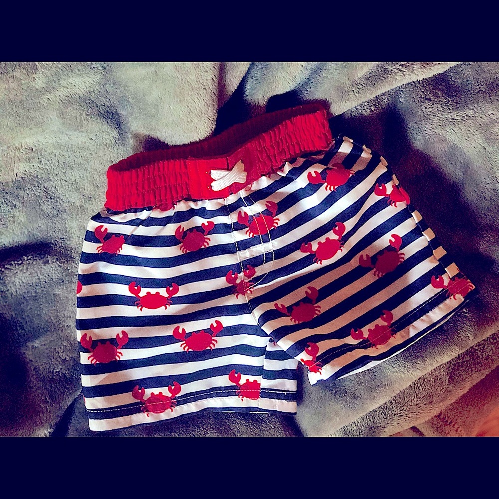 LIKE NEW Infant swim trunks 0-3months